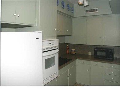 Kitchen includes, smooth cook top range, refrigera