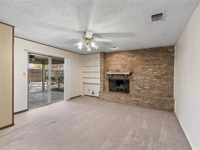4707 - Family Room with ceiling fan, sliding door 