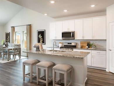 Photo is not of the actual home, but is an inspirational photo of builder’s model home and may depict options, furnishings, and/or decorator features that are not included