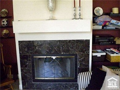 Decorative fireplace with marble front