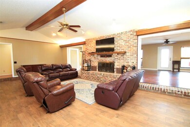 Living room with hardwood / wood-style flooring, l
