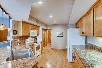 Kitchen is adjacent to laundry & downstairs office