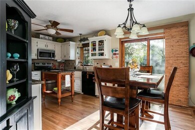 Kitchen sitting area has patio doors that lead to 