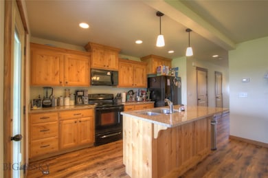 Open kitchen with granite center island.