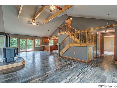 Great Room. Gas fireplace and sliders to the water