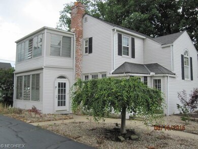 Enclosed side porches add extra living space.