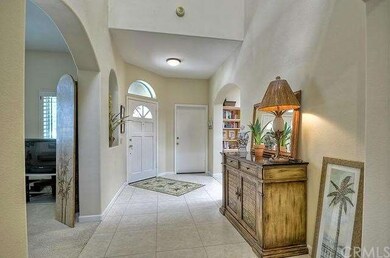 ENTRY OFFERS HIGH VAULTED CEILINGS