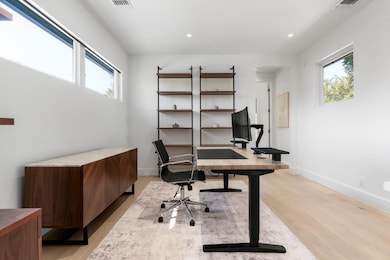 A dedicated office presents a quiet space for work, creativity, or calls, and is the perfect flex space on the second floor.