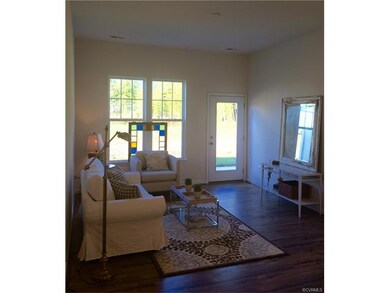 Comfortable living area with a door leading to the