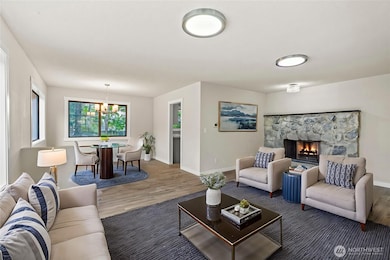 Living Room Upstairs with 2 sided Fire Place -Virtually Staged