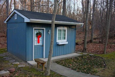 Cute garden shed complete with electricity and con