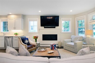 Living room is spacious with gas fireplace and lar