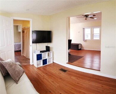 looking from living room into dining area to the r