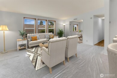 VIRTUALLY STAGED - Living Room with a Wall-of-Windows with Blinds