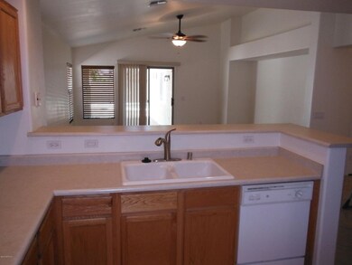 Kitchen Looks out to Greatroom