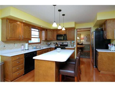 Kitchen. Nice breakfast bar in kitchen, lots of ca