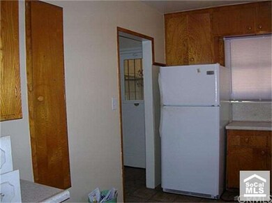 Vintage built-in ironing board in kitchen