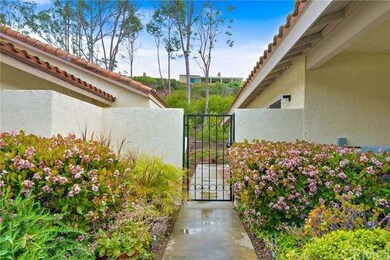 Gated courtyard entry.