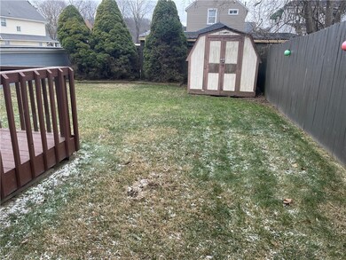 Back yard, fenced on 1 side. Shed included.