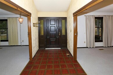 Attractive entry foyer, formal living / dining roo