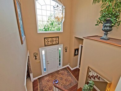 Inviting 2-story entry highlighted by hardwood flo