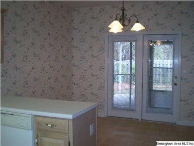 DOOR OPEN ONTO SREENED PATIO
