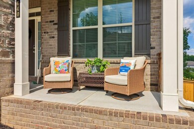 Enjoy the Sunny Front Porch Area