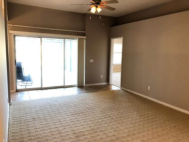Living Room with Disappearing Glass Wall