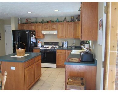 Kitchen. THERE ARE FRENCH DOORS WHICH OPEN OUT TO THE 4 SEASON ROOM.