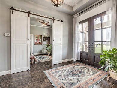 Double barn doors highlight this study or 5th bedr