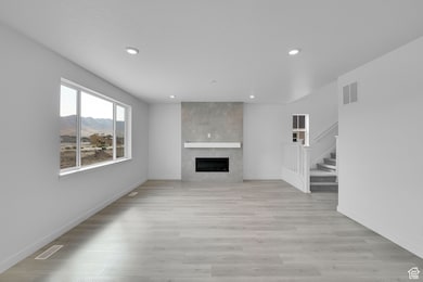 Main floor family room and fireplace, tons of natural