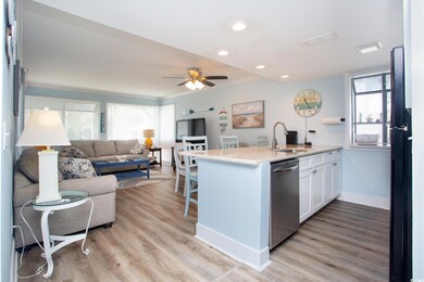 Kitchen featuring a healthy amount of sunlight, di