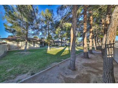 Facade/Exterior Front. Trees & foliage create plen