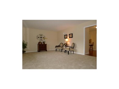 Another view of living room with easy access to ki