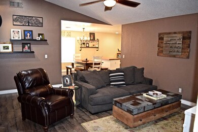 Living room with vaulted celings