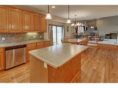 You can see the vaulted living room in the backgro