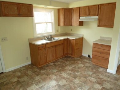 Kitchen New Oak Cabinets and Flooring
