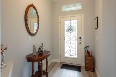 Foyer with custom front door