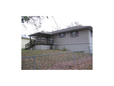 Back of Home with Covered Deck, fully fenced back 