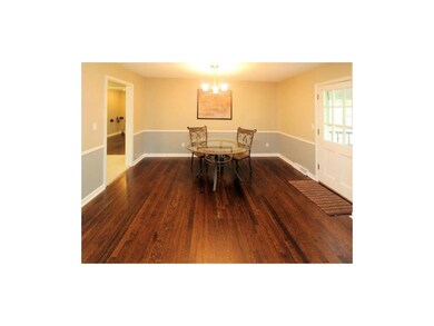 Dining area in convenient location between kitchen
