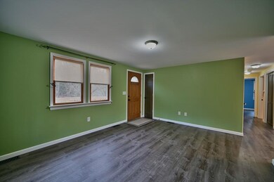 The Living Room is spacious & bright with a deep c