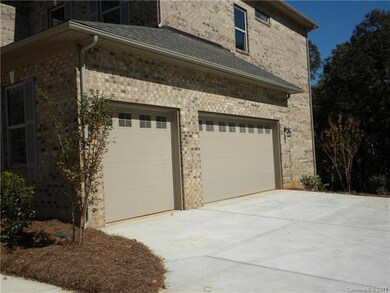Four sides brick with a three car garage!