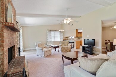 Family room open to the kitchen and and dining.