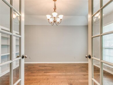 Freshly painted office with french doors and built
