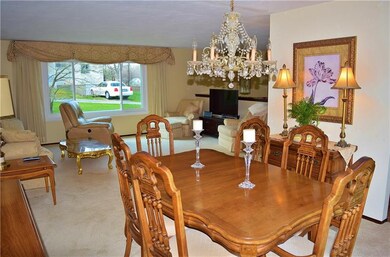 Dining Room opening into the lovely Living Room