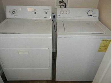 Kitchen. Laundry located in kitchen.