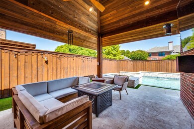 Fabulous cedar covered outdoor living area is perf