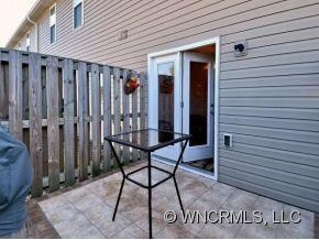Tiled Patio with privacy fence