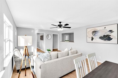 Dining area featuring light wood-style floors, bas
