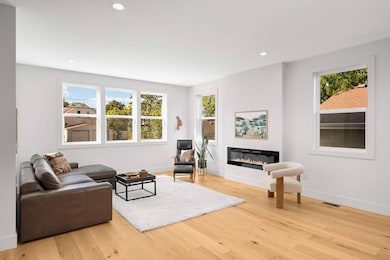 Living room with a cozy electric fireplace